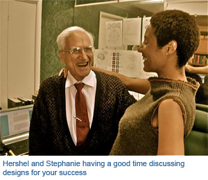 Hershel and Stephanie having a good time discussing designs for your success